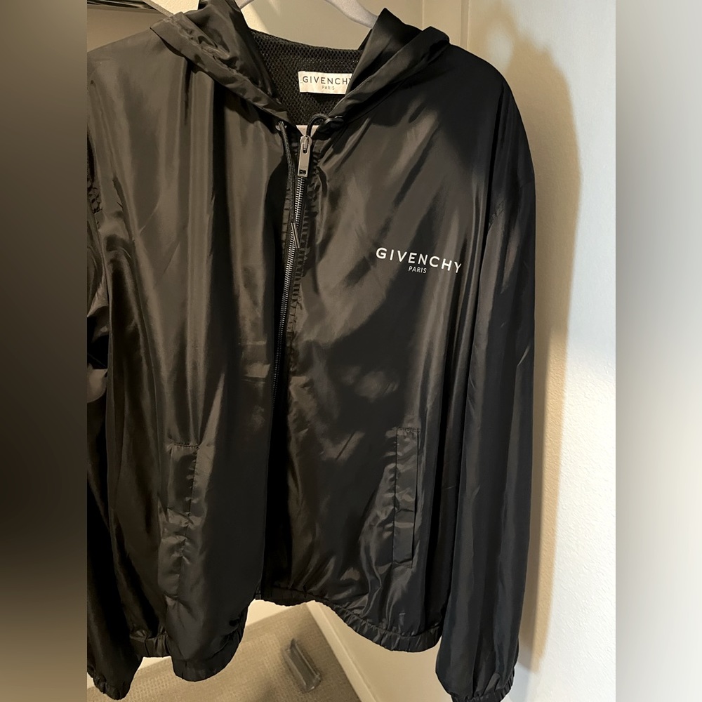 Multi pocket Givenchy windbreaker with small logo on from big logo on back